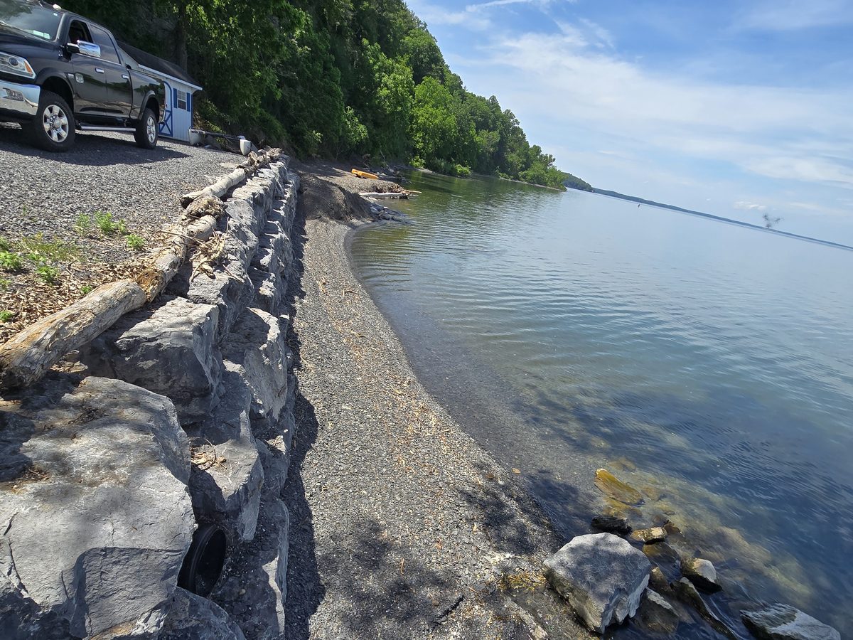 Shoreline wall with a wide view up the lake