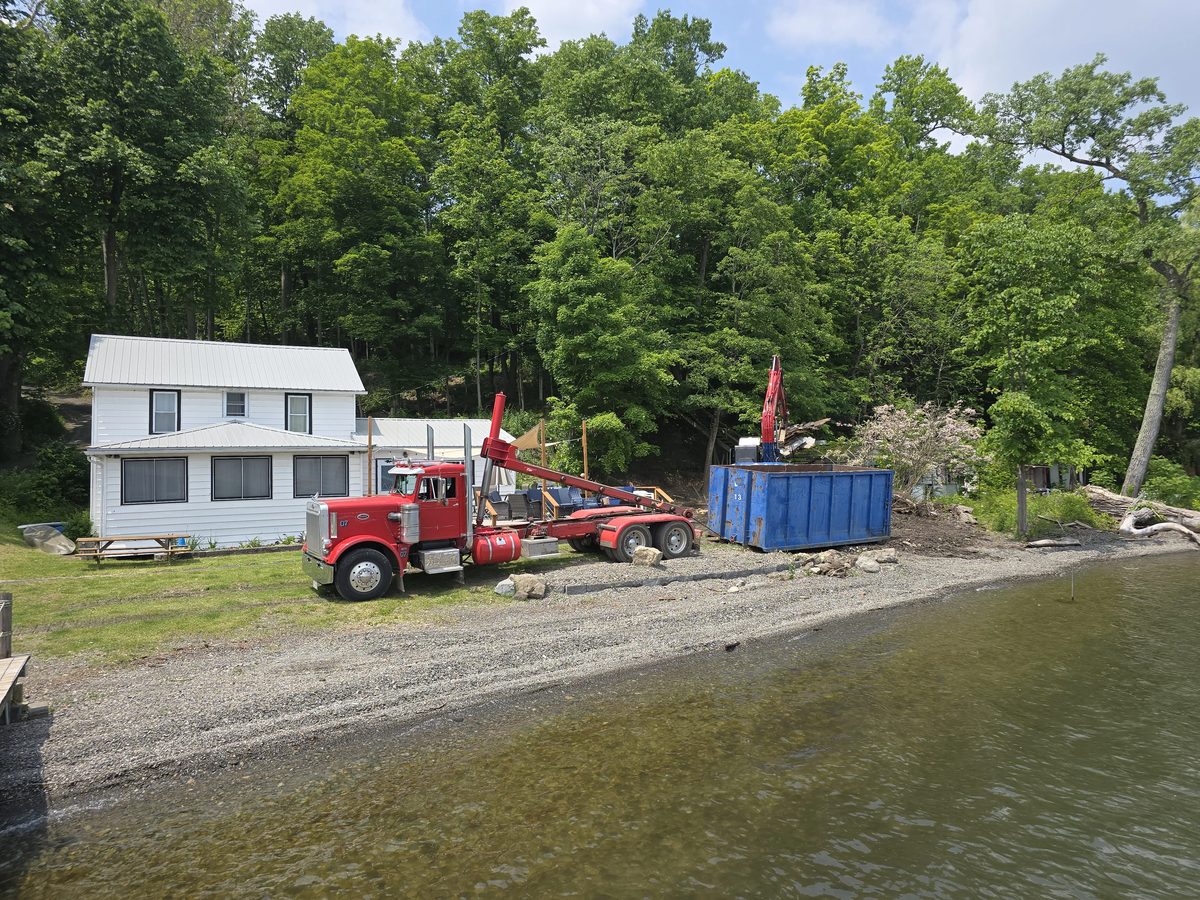 Roll-off dumpster during a lakefront cottage cleanout