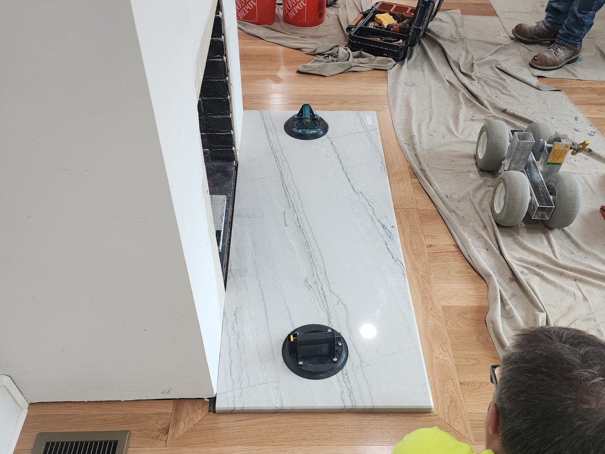Stone hearth slab being set